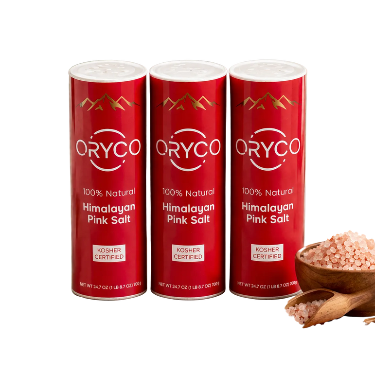 Oryco Himalayan Pink Salt canisters on a neutral background with salt crystals and a wooden bowl.