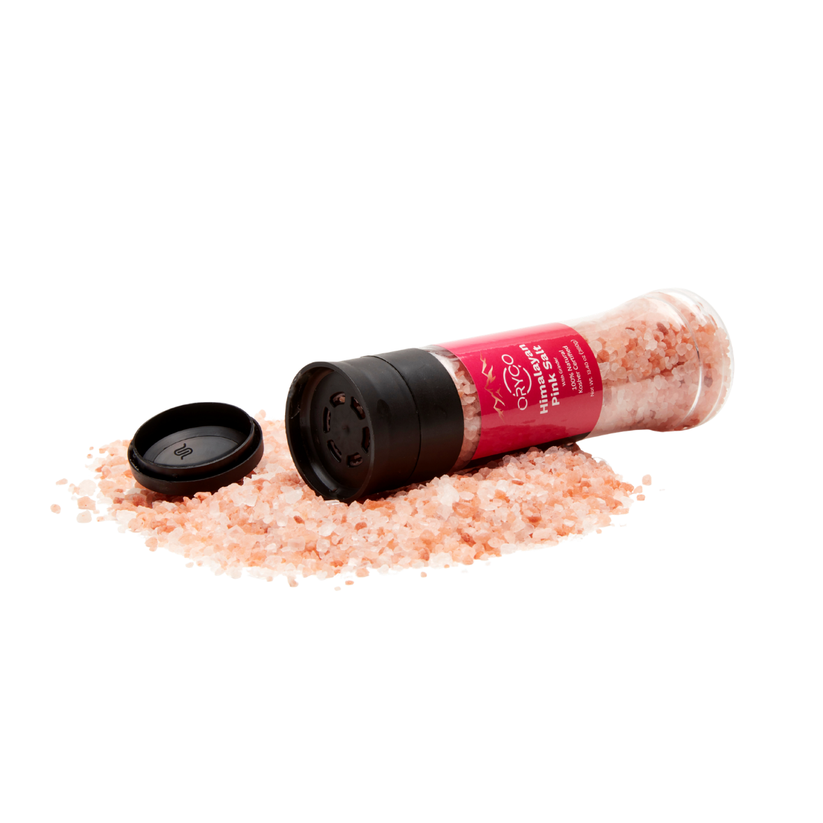 Himalayan pink salt shaker with pink salt on a white background