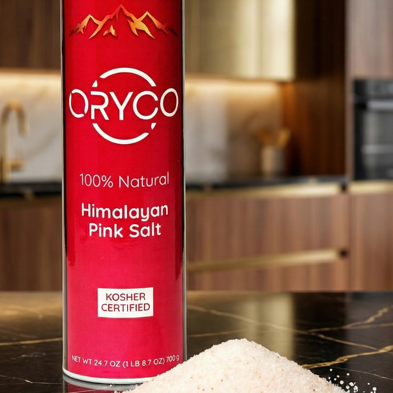 Oryco Himalayan Pink Salt canister on a kitchen counter with salt